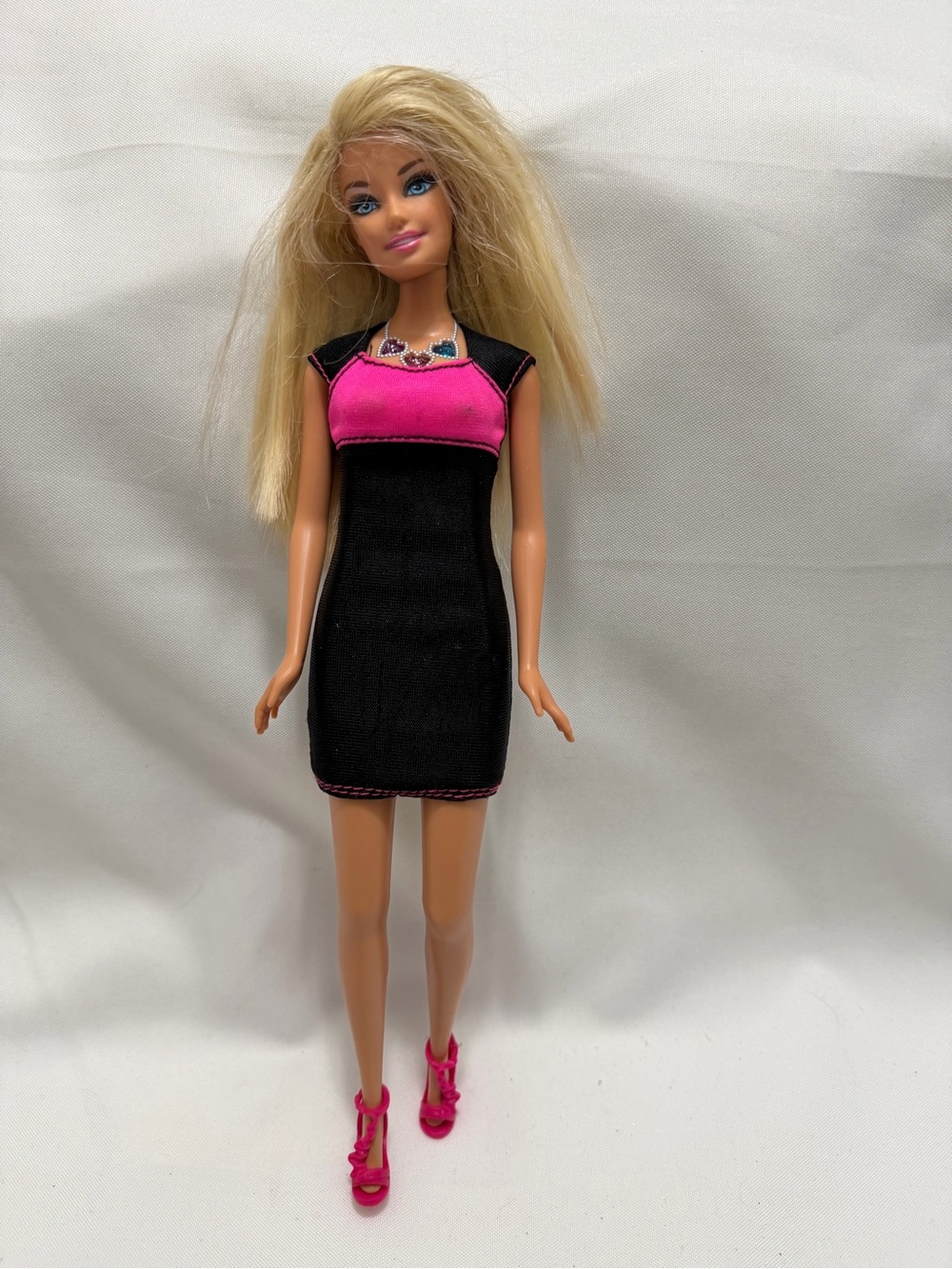 Barbie Black Dress with Bright Pink Accents and Pink Heels It didn’t work